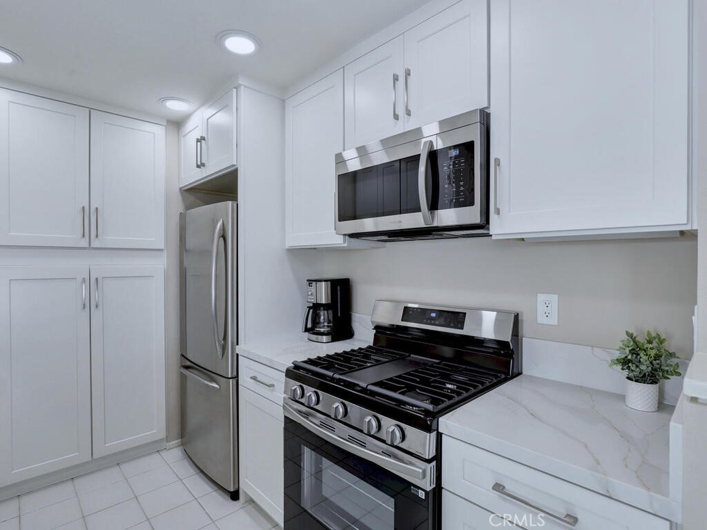 71 Cloudcrest Aliso Viejo, CA 92656 - Photo 13 of 44 Brand New Kitchen- with lights under the cabinets.