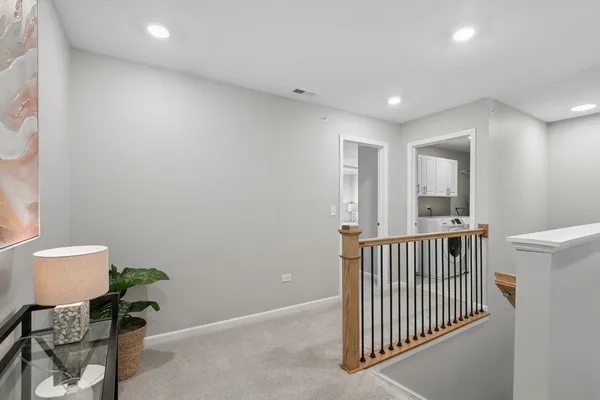 a view of room with stairs and a window