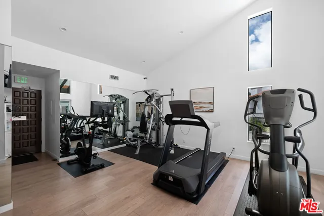 a swimming pool with outdoor seating and yard