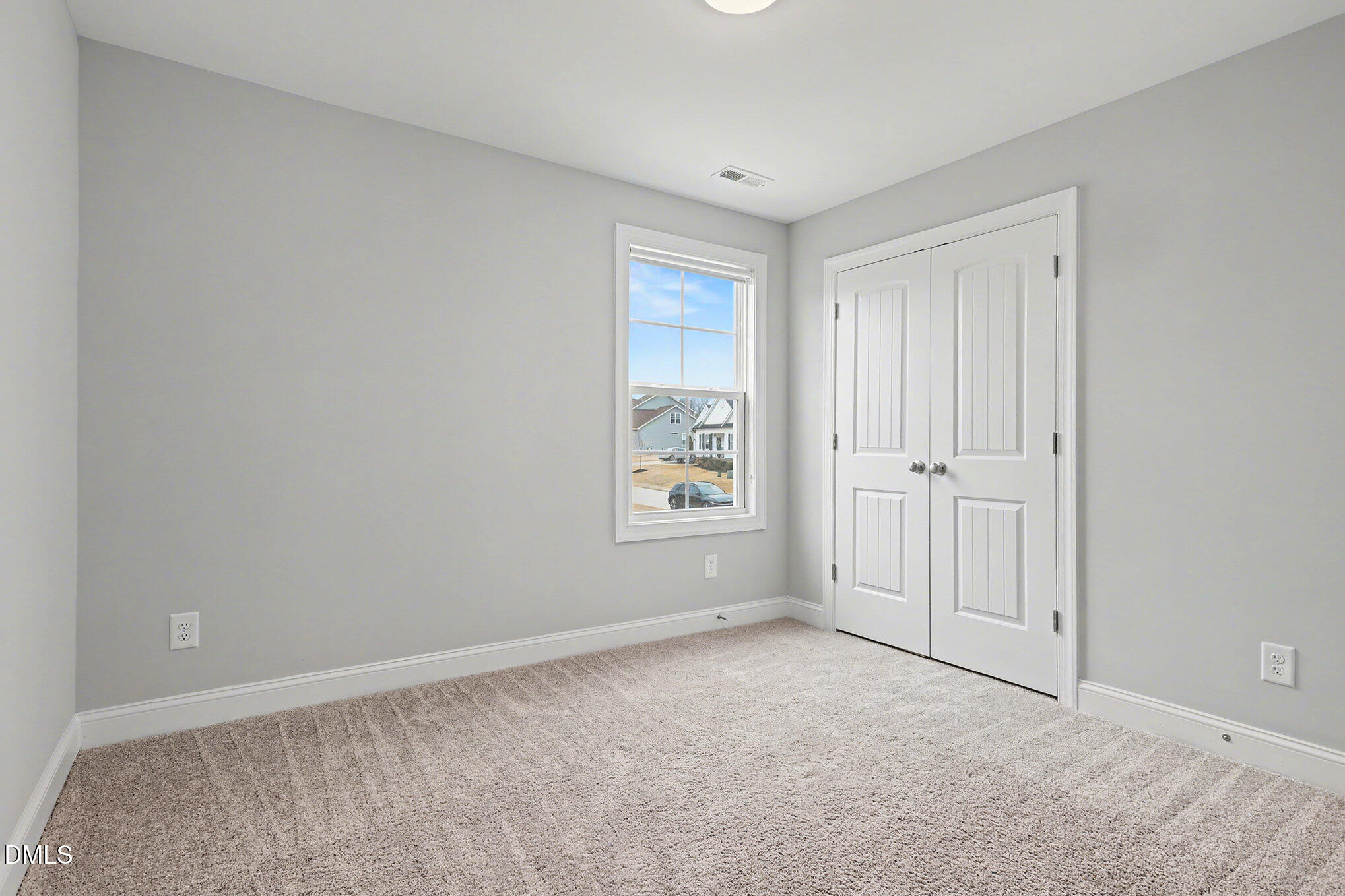 274 Howards Crossing Drive Wendell, NC 27591 - Photo 21 of 40 a view of an empty room and window