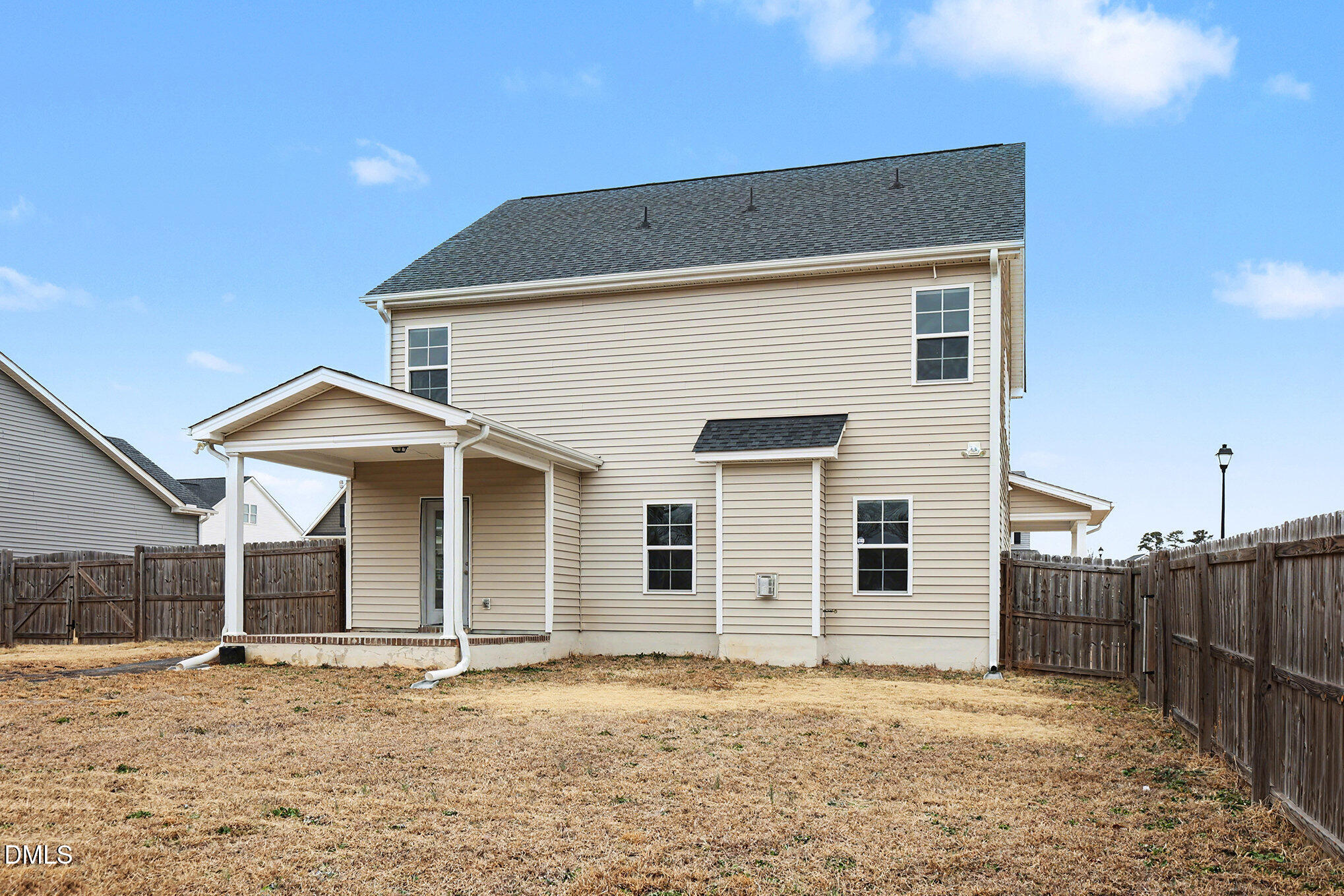 274 Howards Crossing Drive Wendell, NC 27591 - Photo 26 of 40 a front view of a house with a yard