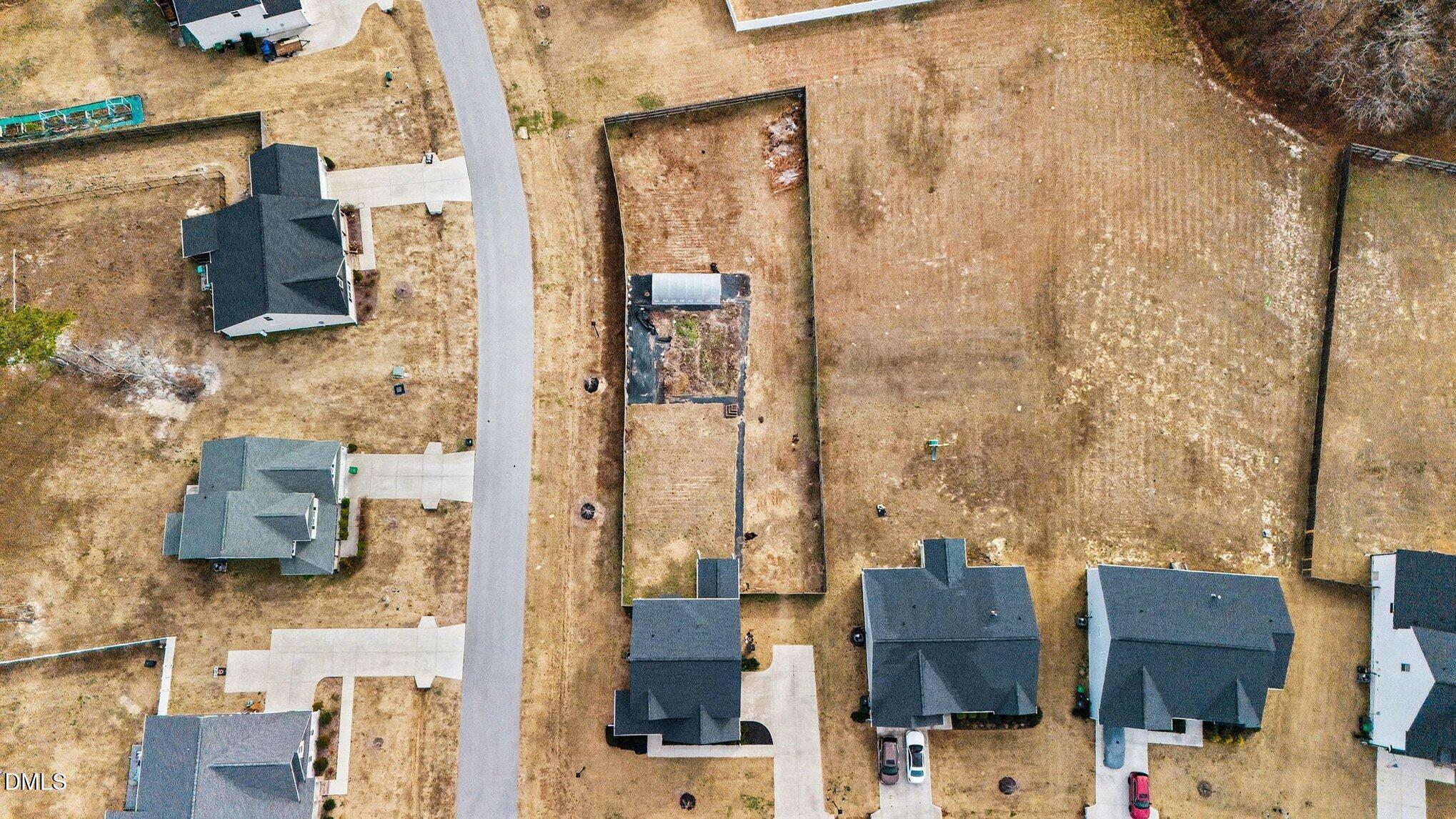 274 Howards Crossing Drive Wendell, NC 27591 - Photo 31 of 40 view of rooftop stairs and livingroom