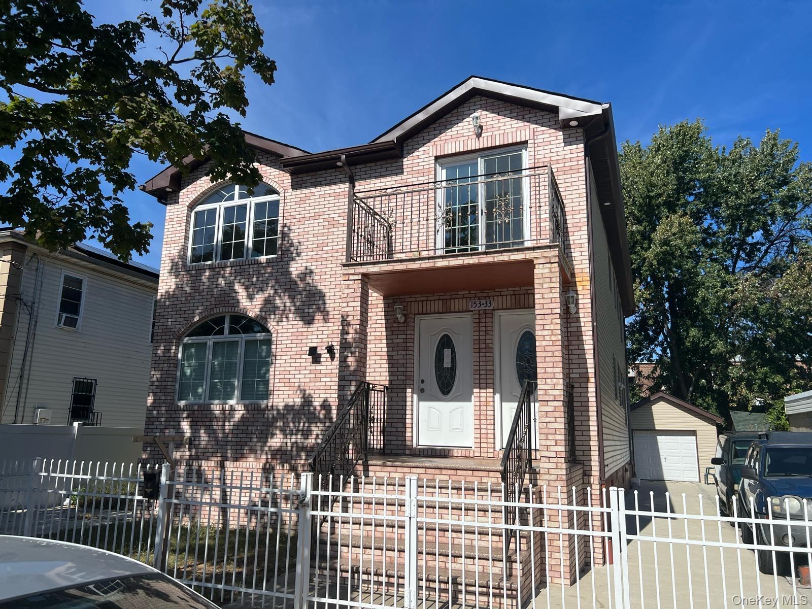 a front view of a house with a porch