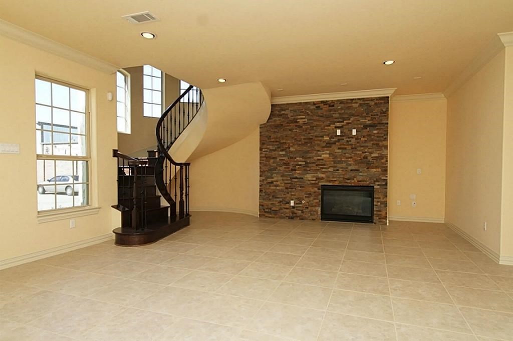 14478 Summerleaf Lane Houston, TX 77077 - Photo 2 of 26 a view of an empty room with windows & cabinet