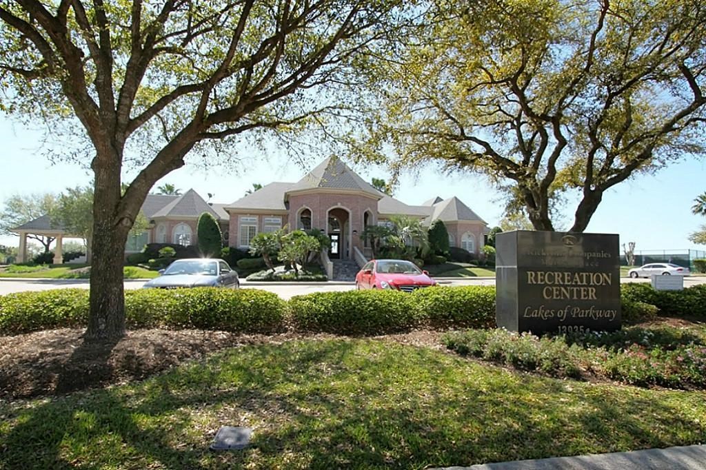 14478 Summerleaf Lane Houston, TX 77077 - Photo 22 of 26 a front view of a house with garden
