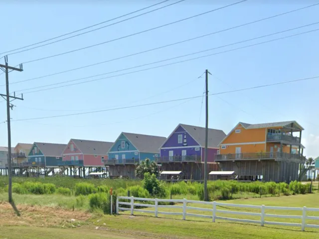 a view of a big yard in front of a house