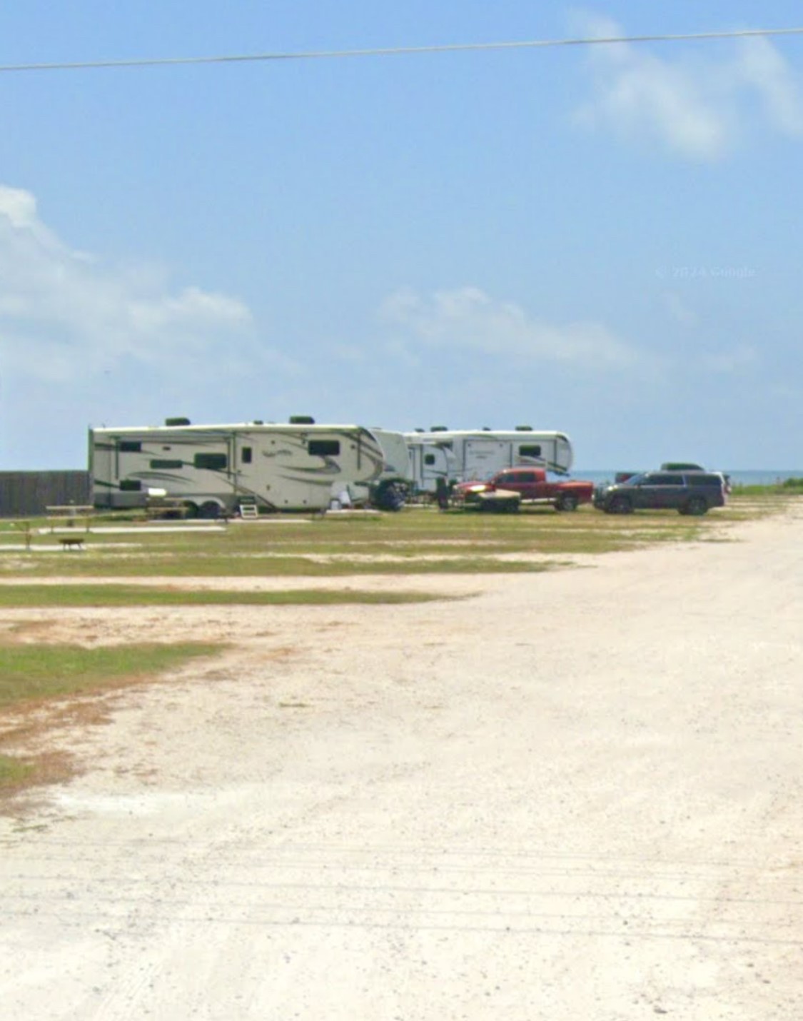 672 Highway 87 Port Bolivar, TX 77650 - Photo 9 of 12 a view of an ocean and beach