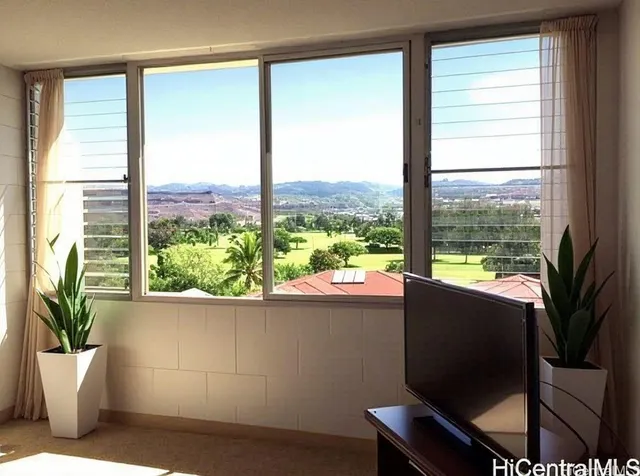 a view of a chair and table in a room