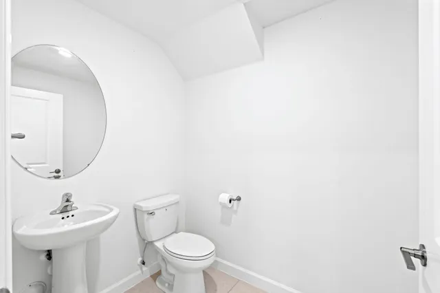 a view of entryway and hall with a window