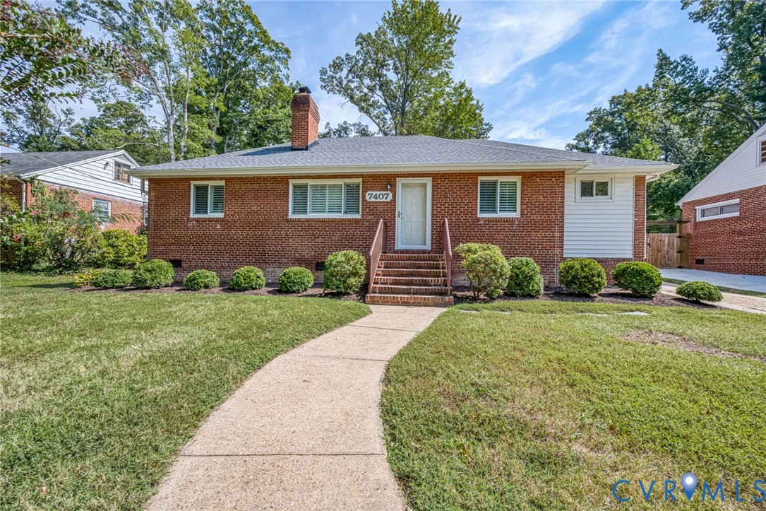 7407 Biscayne Road Henrico, VA 23294 - Photo 2 of 40 a front view of a house with garden