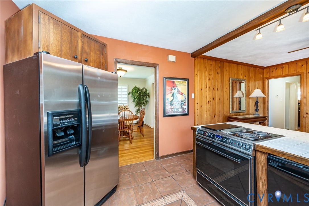 7407 Biscayne Road Henrico, VA 23294 - Photo 23 of 40 a kitchen with stainless steel appliances granite countertop a refrigerator and a stove