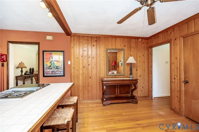 a view of a house with backyard and deck