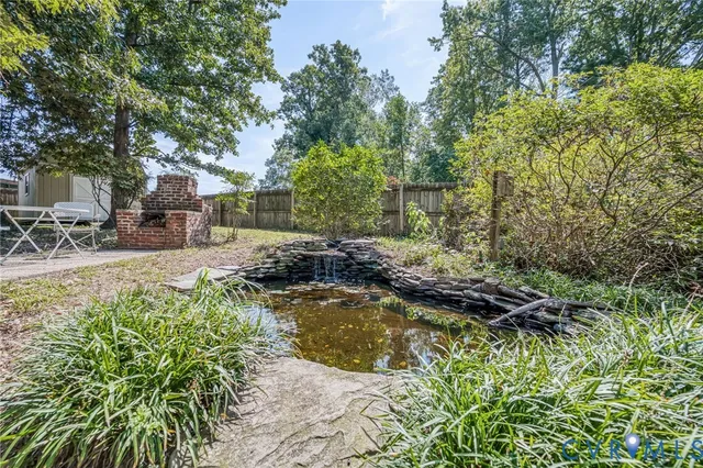 a backyard of a house with lots of green space