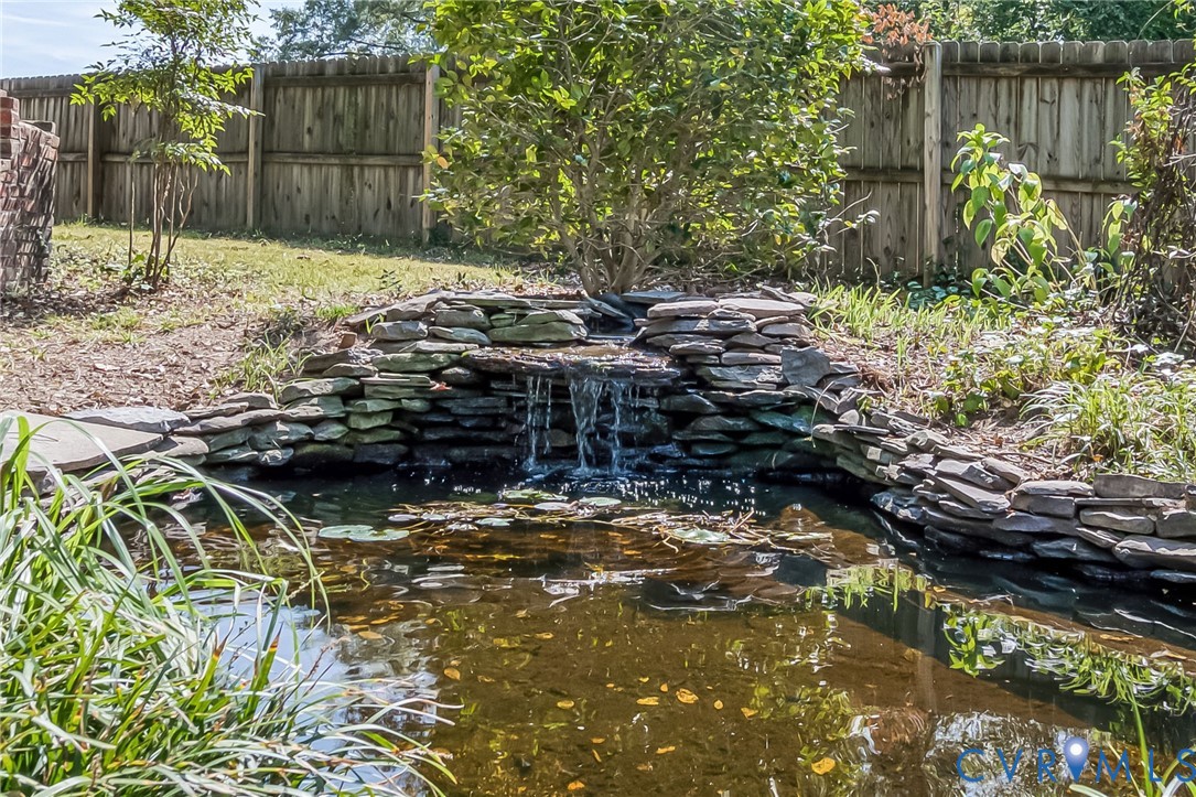 7407 Biscayne Road Henrico, VA 23294 - Photo 37 of 40 a backyard of a house with lots of green space