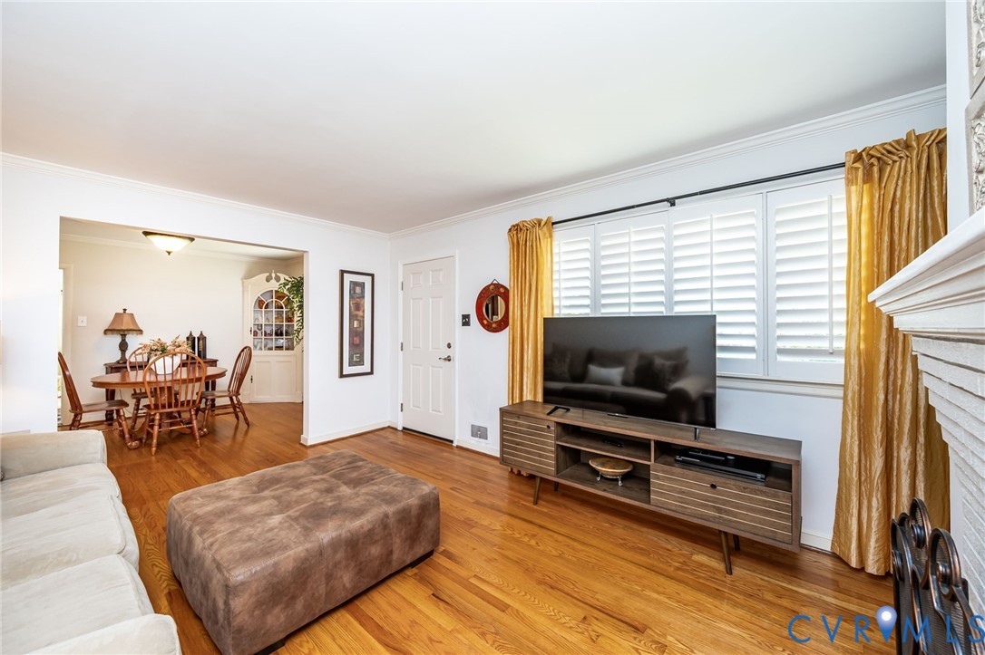 7407 Biscayne Road Henrico, VA 23294 - Photo 6 of 40 a living room with furniture and a flat screen tv