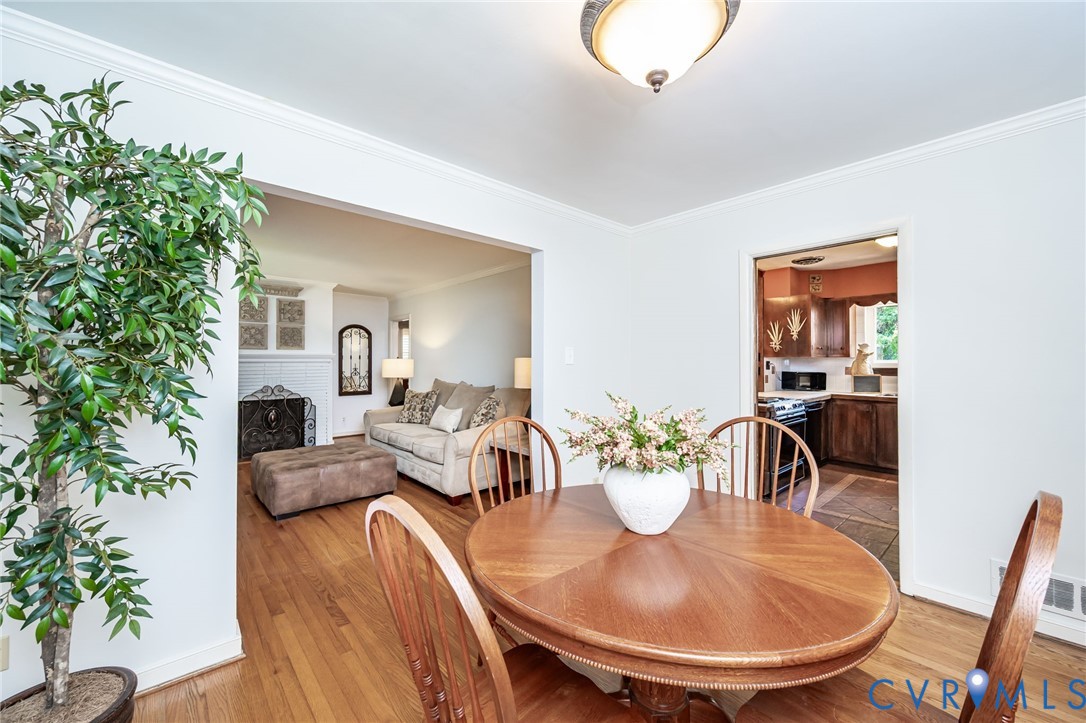 7407 Biscayne Road Henrico, VA 23294 - Photo 9 of 40 a view of a dining room with furniture and wooden floor
