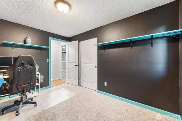 a view of a hallway with elevator