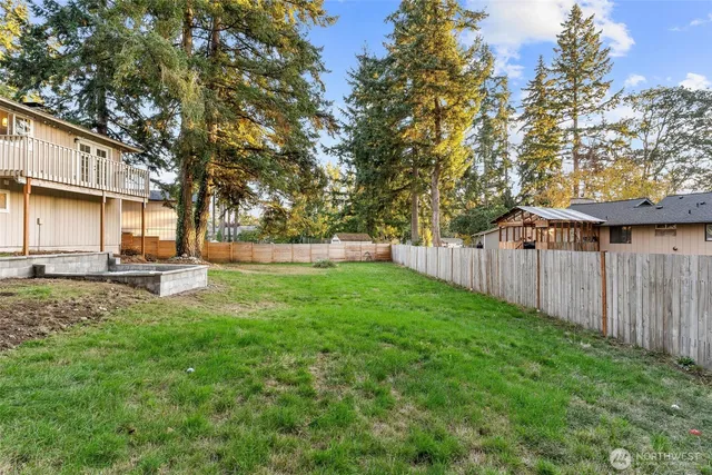 a view of backyard with green space