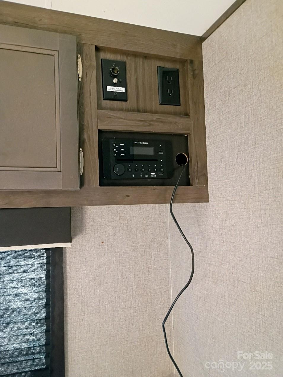 290 Wallace Road Ellenboro, NC 28040 - Photo 12 of 18 a living room with a fireplace