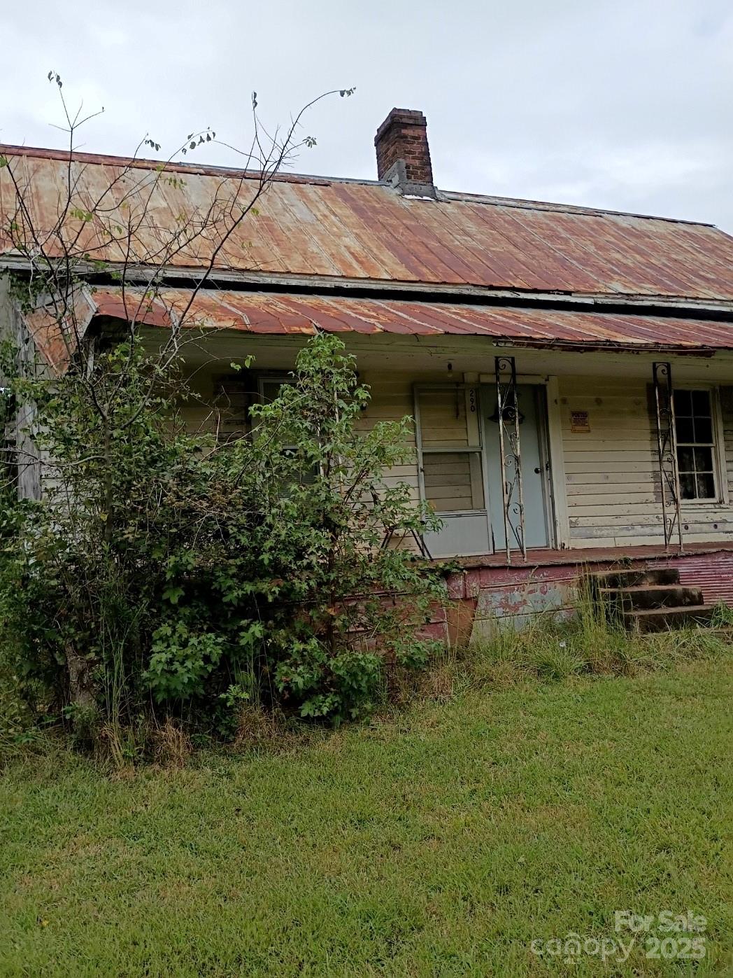 290 Wallace Road Ellenboro, NC 28040 - Photo 7 of 18 a backyard of a house with lots of green space