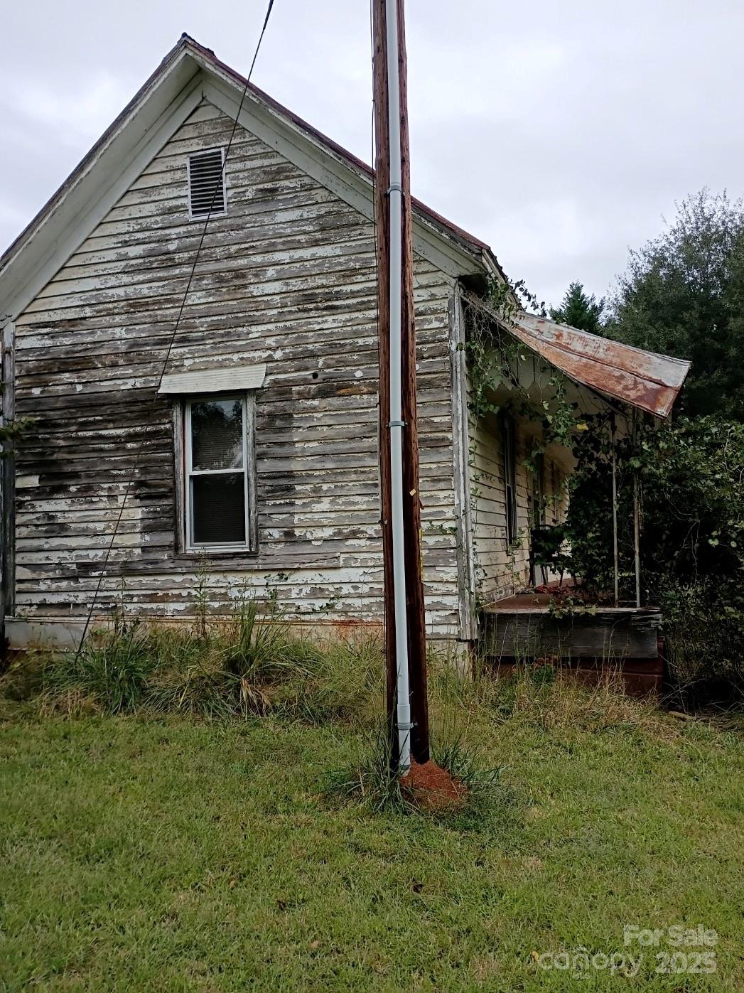 290 Wallace Road Ellenboro, NC 28040 - Photo 8 of 18 a backyard of a house with lots of green space