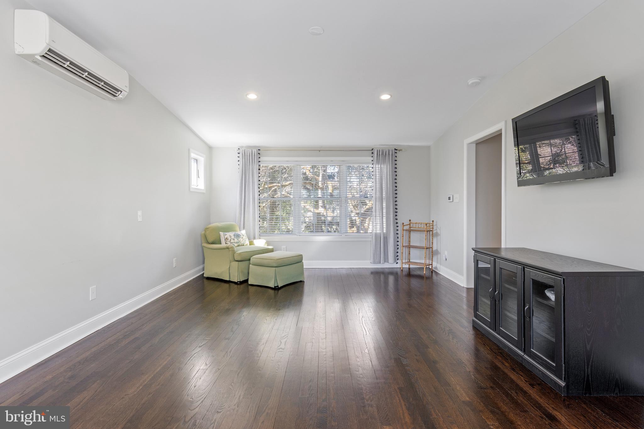 129 Clover Hill Lane Wayne, PA 19087 - Photo 23 of 41 wooden floor in an empty room with a window