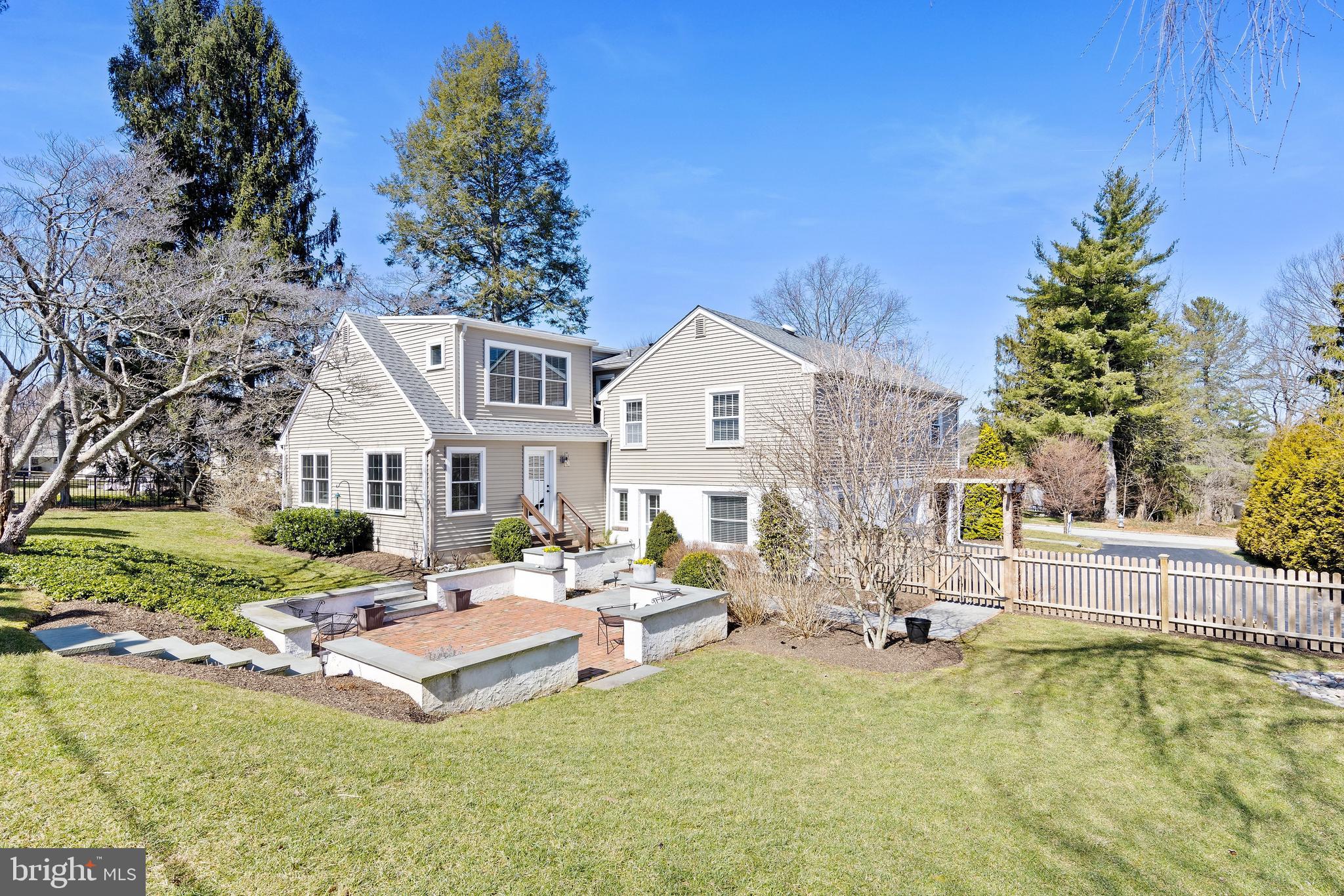 129 Clover Hill Lane Wayne, PA 19087 - Photo 35 of 41 a front view of house with yard and seating area
