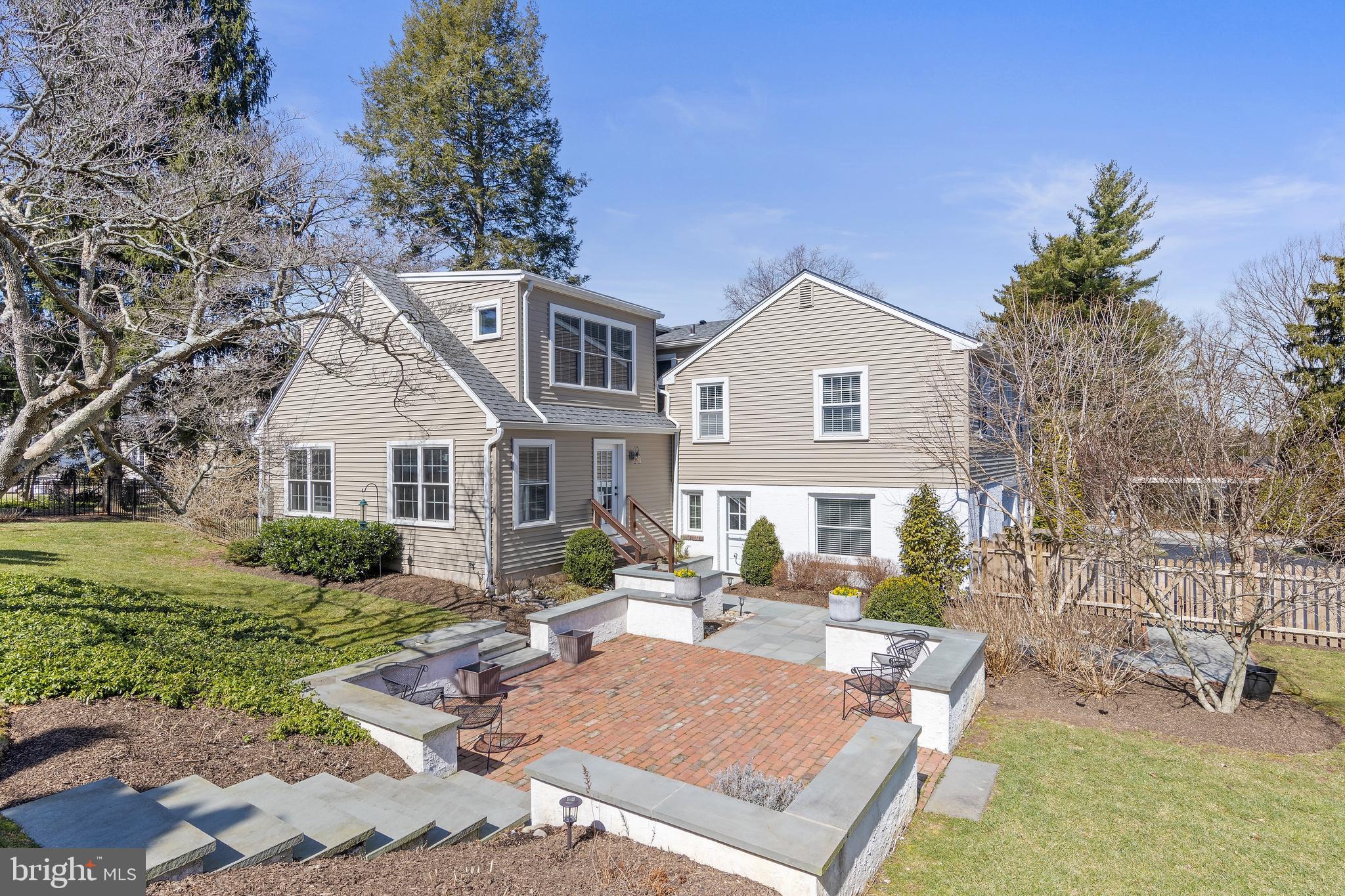 129 Clover Hill Lane Wayne, PA 19087 - Photo 36 of 41 a front view of a house with garden