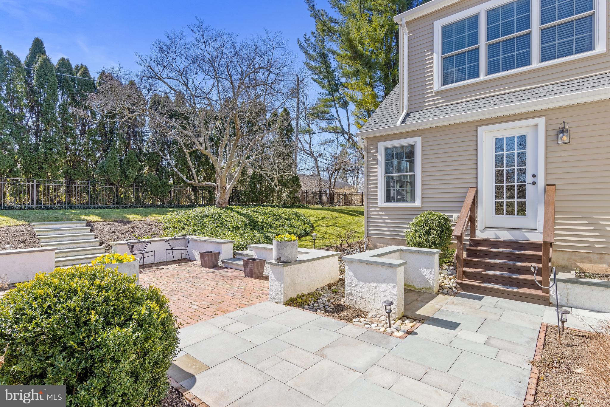 129 Clover Hill Lane Wayne, PA 19087 - Photo 38 of 41 a view of swimming pool with outdoor seating and plants