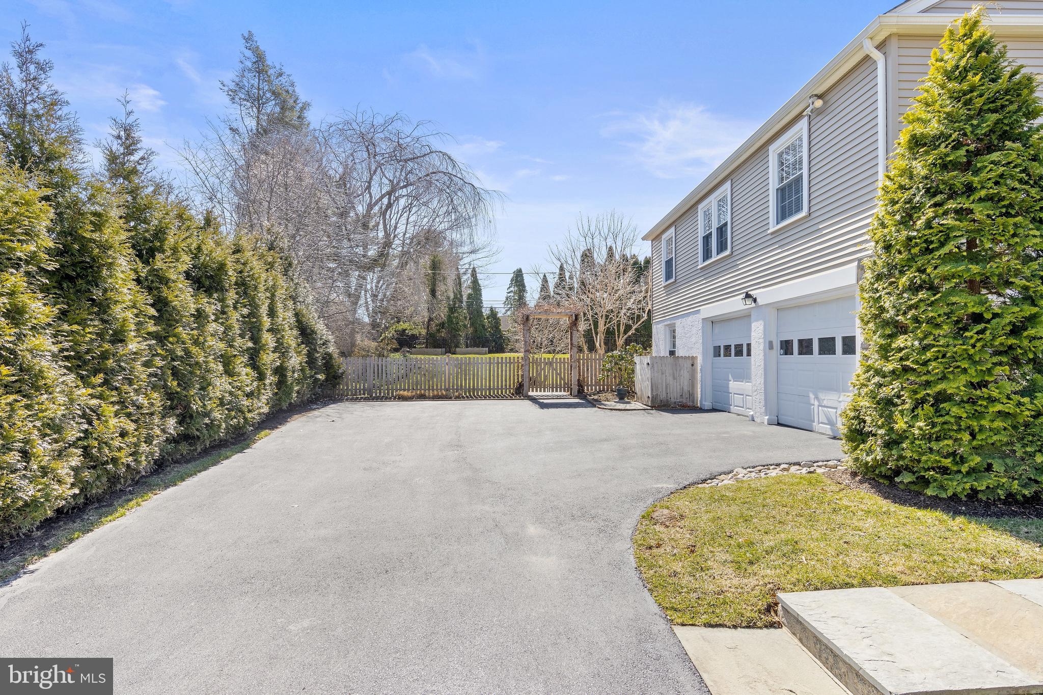 129 Clover Hill Lane Wayne, PA 19087 - Photo 41 of 41 a view of a house with a yard and pathway