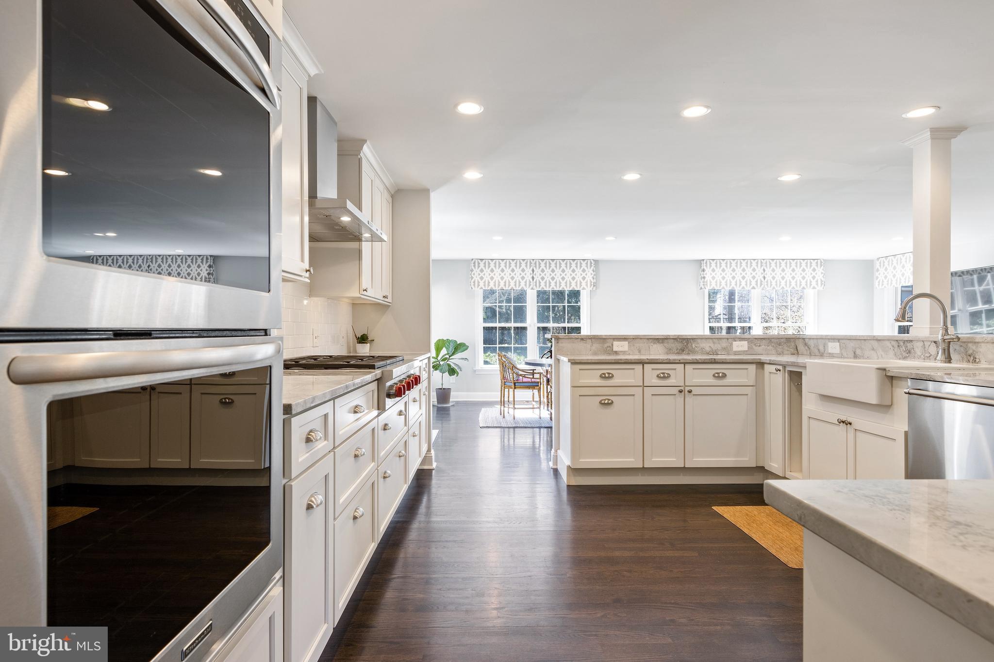 129 Clover Hill Lane Wayne, PA 19087 - Photo 8 of 41 a kitchen with stainless steel appliances sink and cabinets