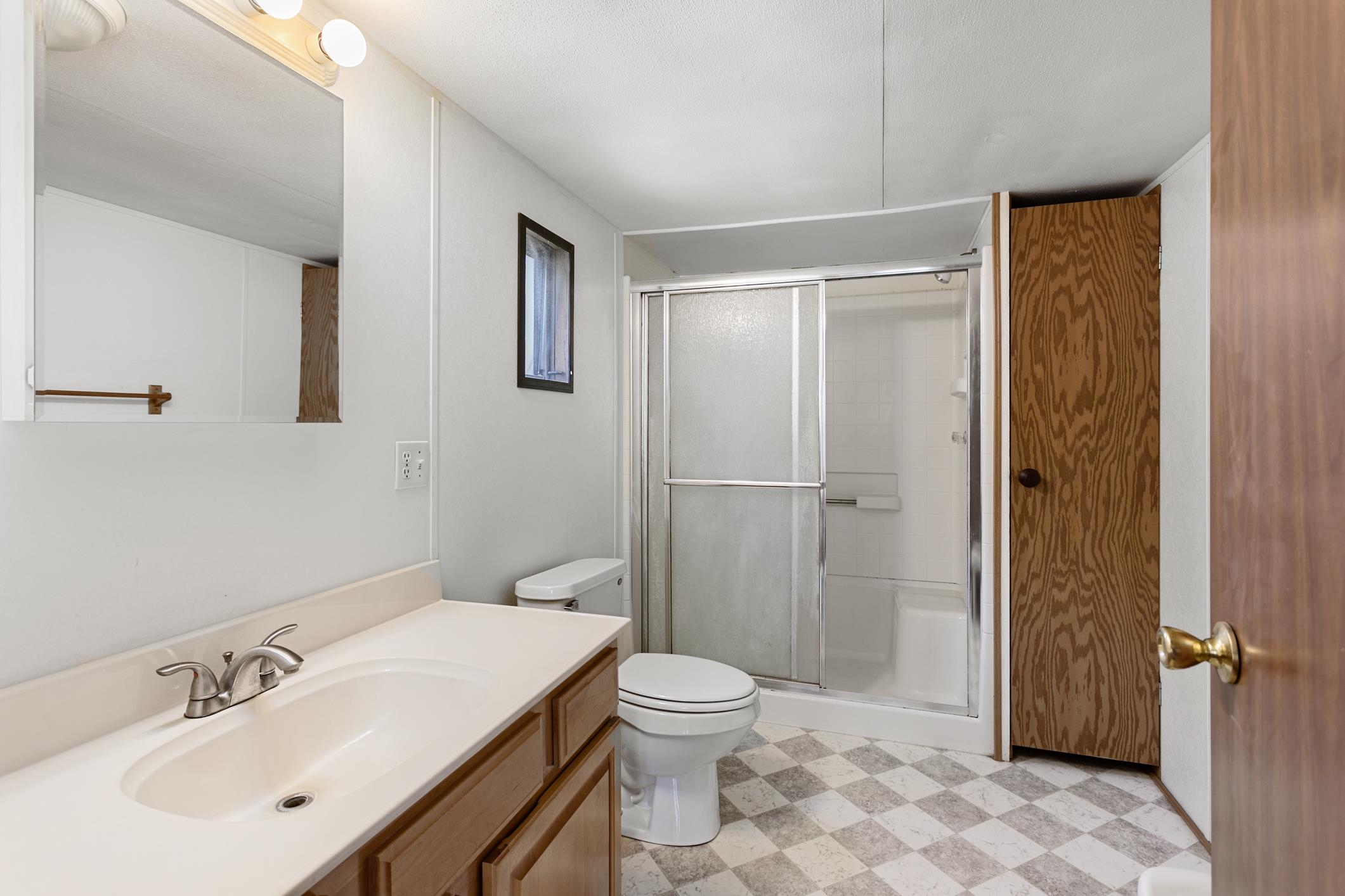 3913 Randall Road Green Cove Springs, FL 32043 - Photo 11 of 43 a bathroom with a sink toilet and shower