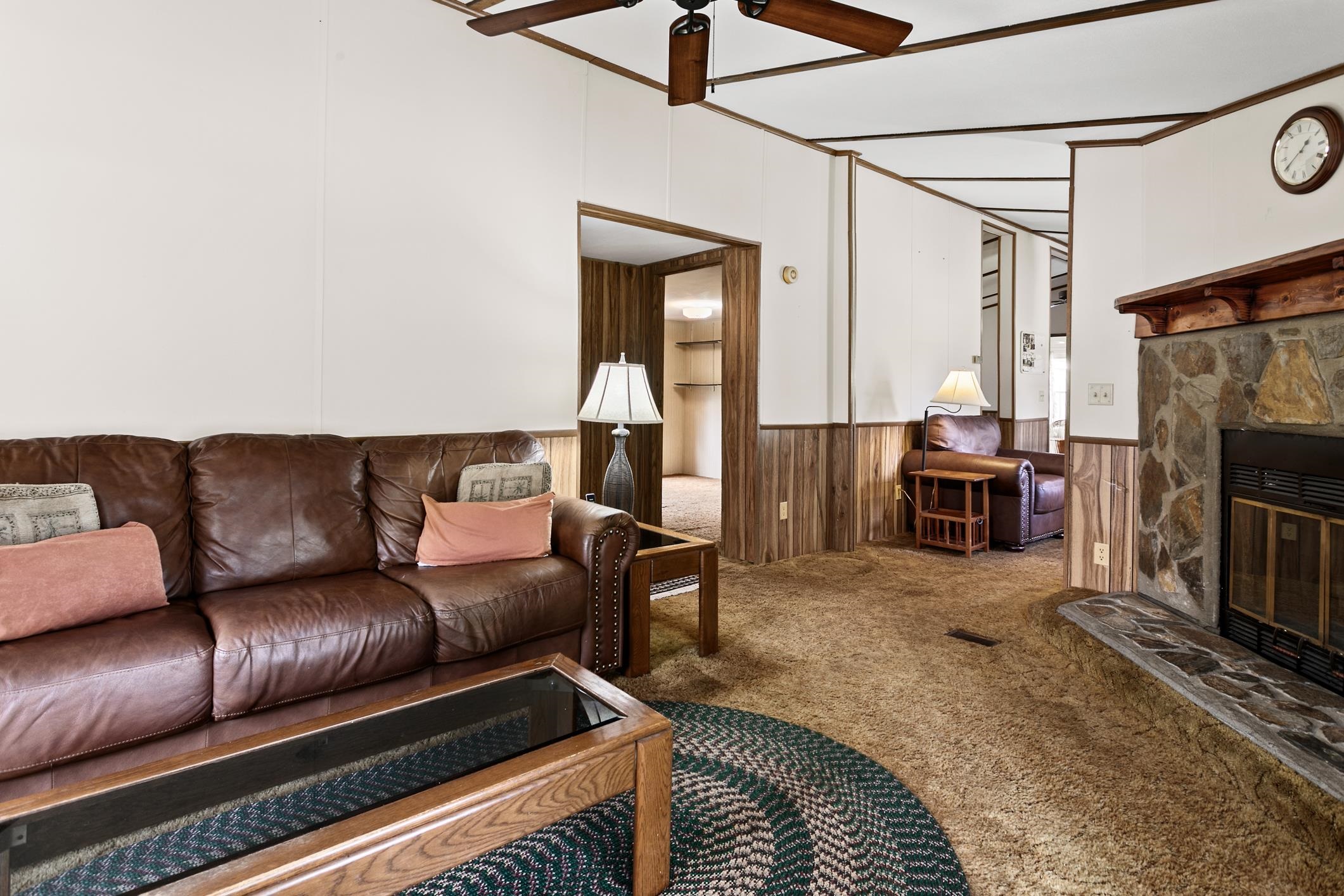 3913 Randall Road Green Cove Springs, FL 32043 - Photo 21 of 43 a living room with furniture and a fireplace