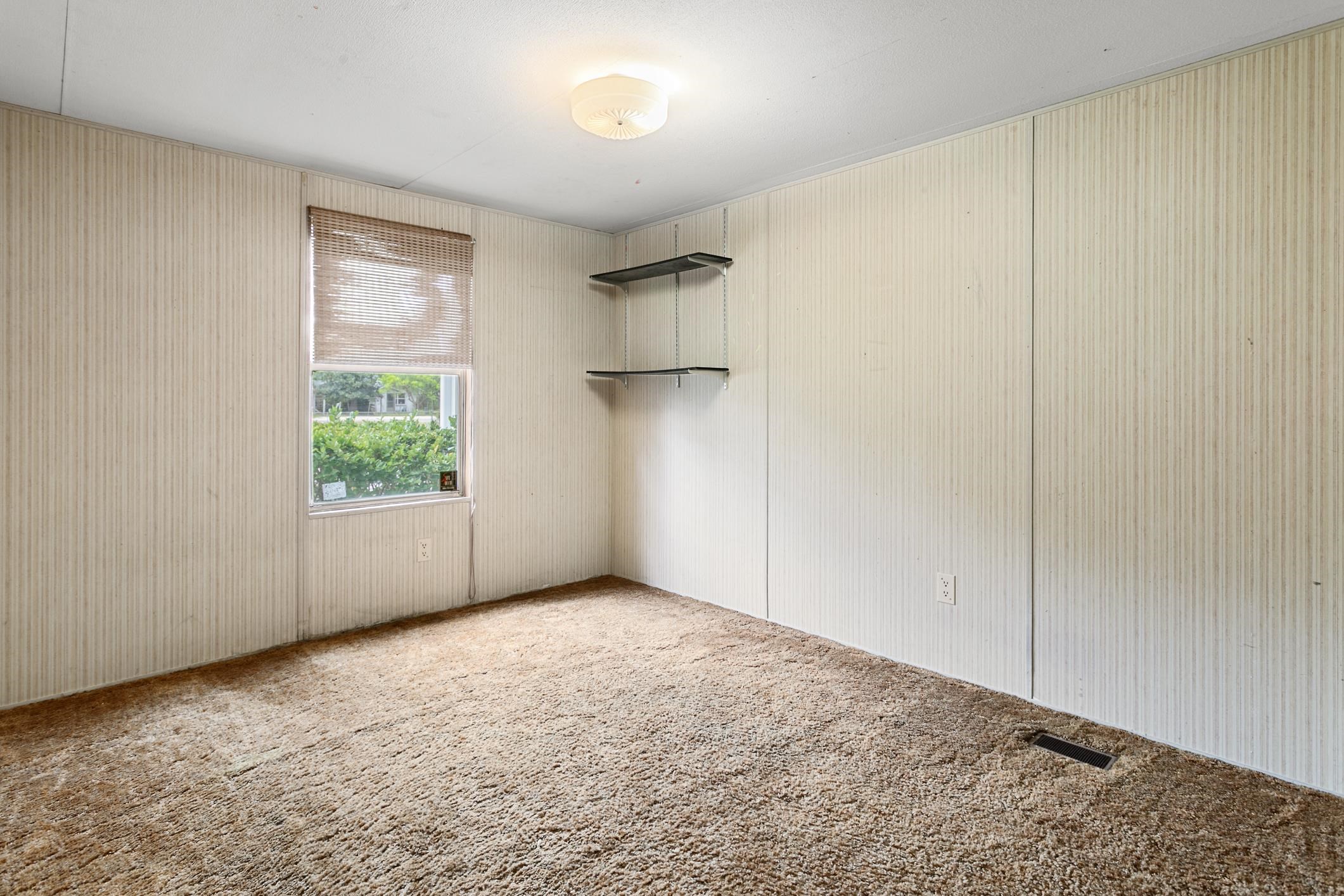 3913 Randall Road Green Cove Springs, FL 32043 - Photo 25 of 43 an empty room with windows