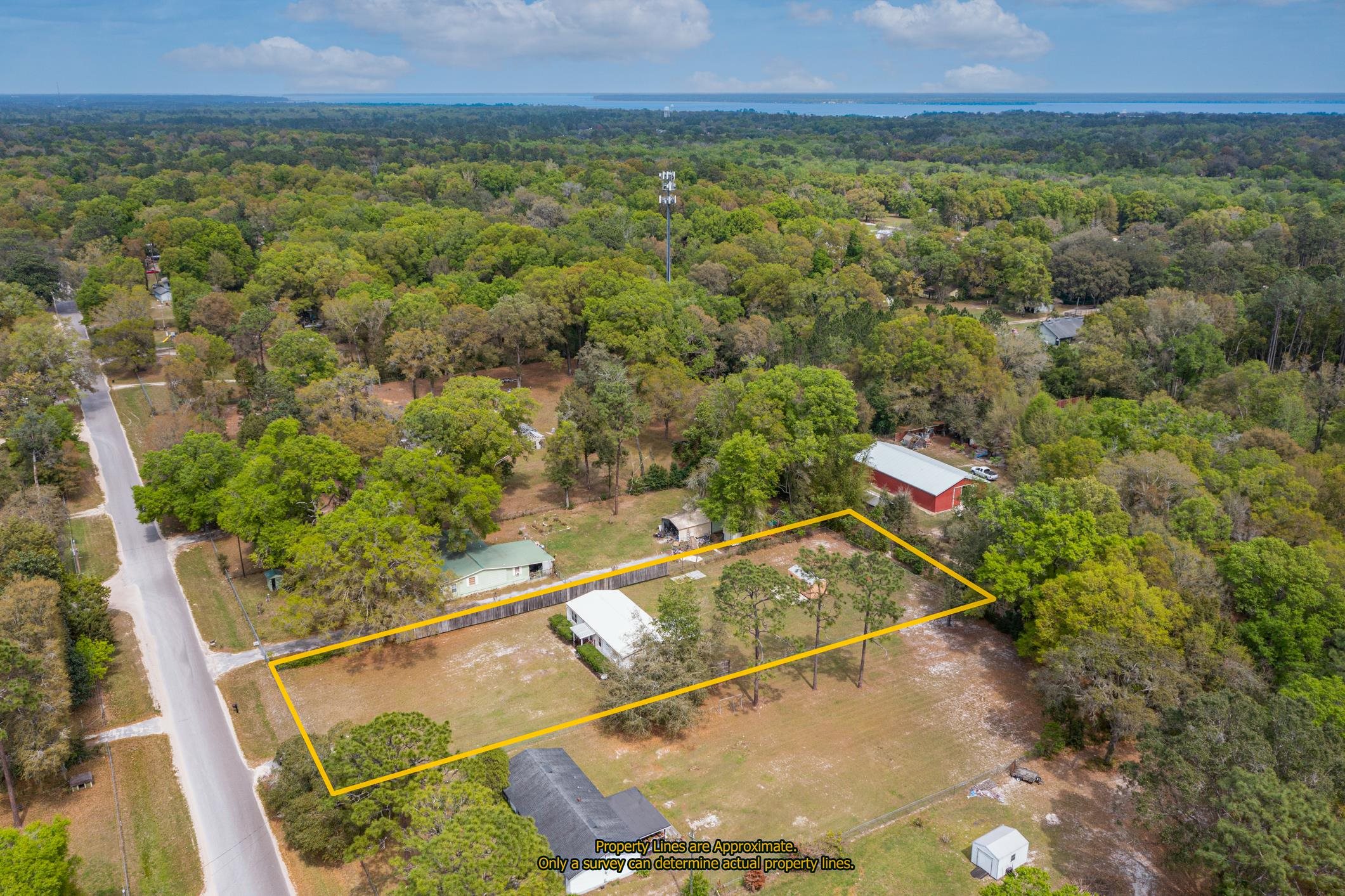 3913 Randall Road Green Cove Springs, FL 32043 - Photo 36 of 43 a view of a tennis court