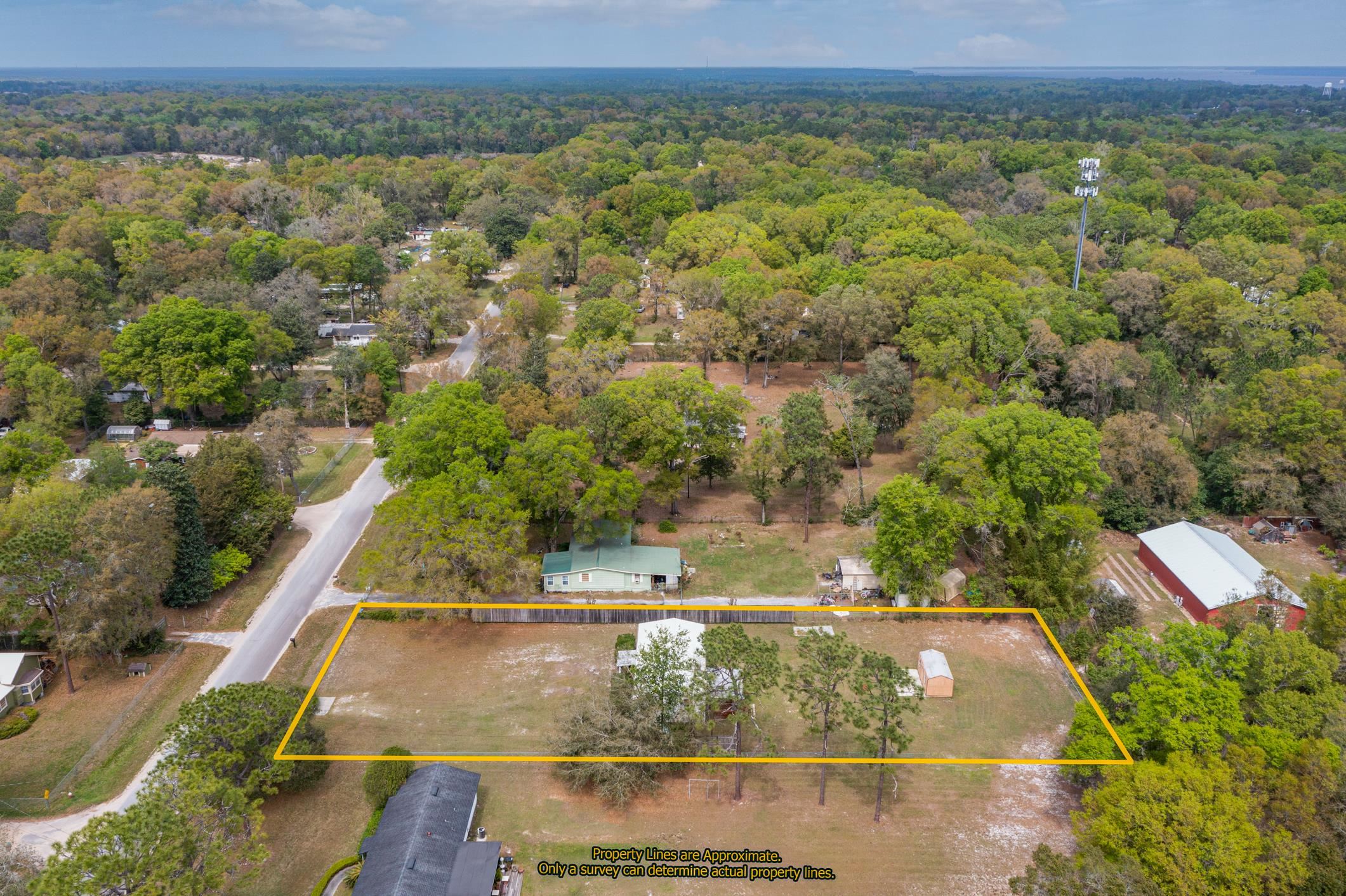 3913 Randall Road Green Cove Springs, FL 32043 - Photo 37 of 43 an aerial view of a house with a yard