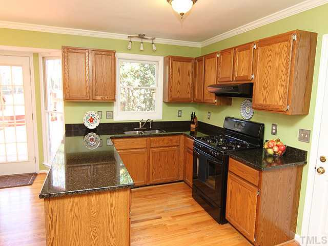 5402 Middleton Road Durham, NC 27713 - Photo 6 of 25 A cook's kitchen with newer gas range, granite counters and under-mount sink, pantry and updated plumbing and lighting fixtures. Kitchen