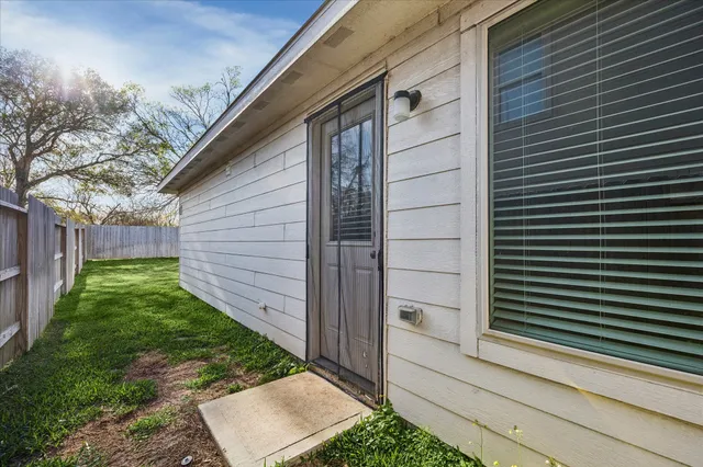 a view of a back yard of the house