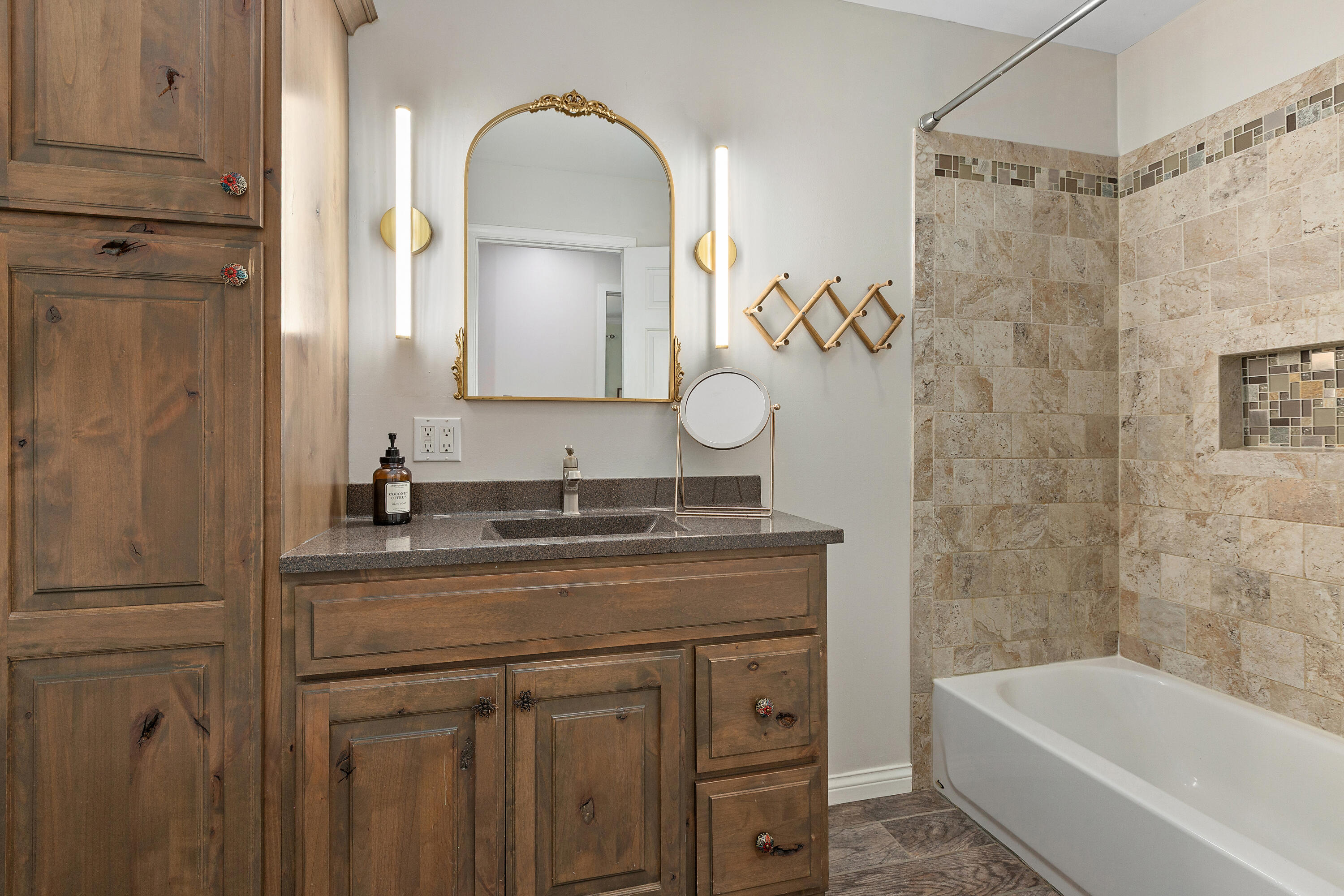 1994 Hidden Valley Drive Crown Point, IN 46307 - Photo 24 of 59 a bathroom with a granite countertop sink a toilet a mirror and shower