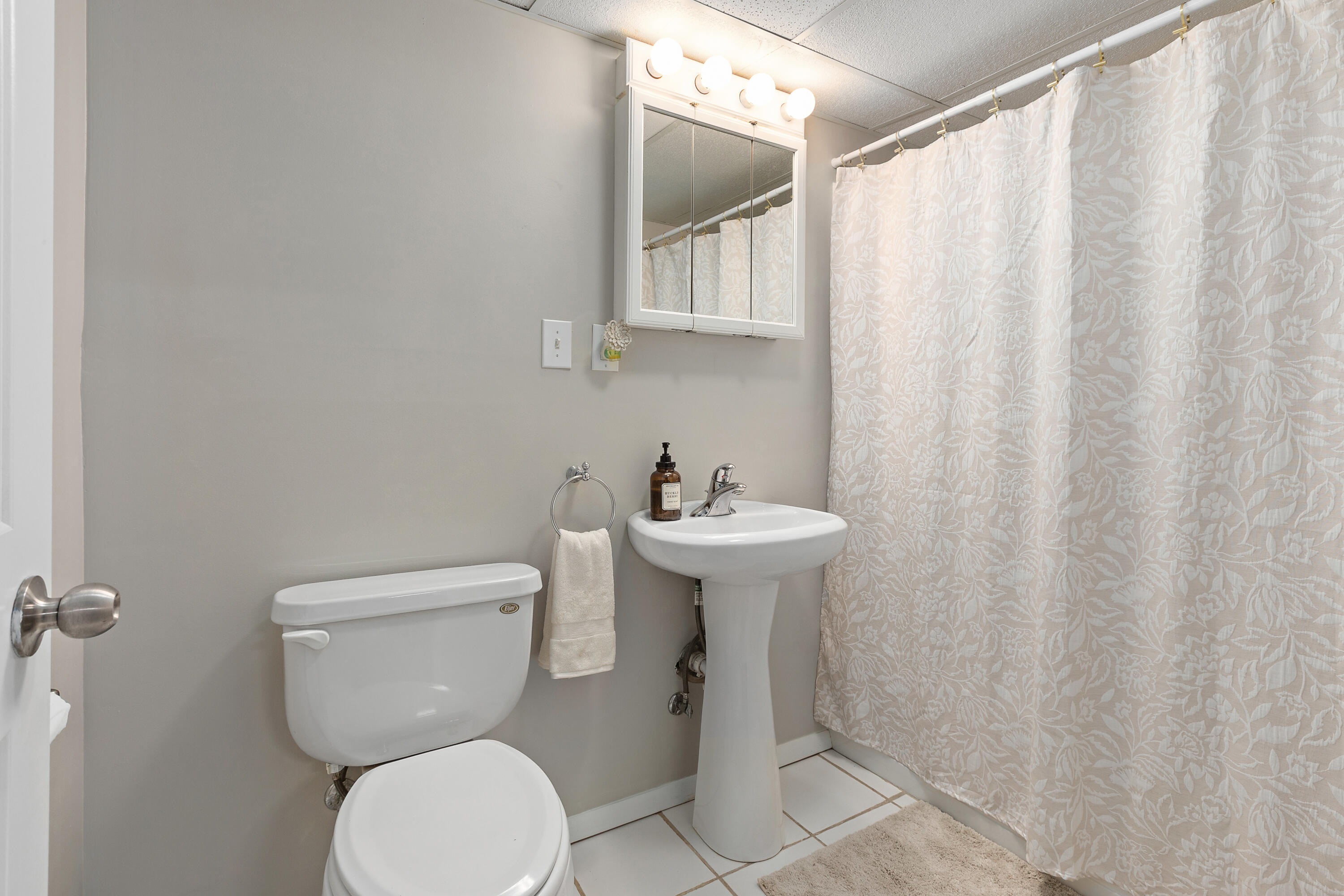 1994 Hidden Valley Drive Crown Point, IN 46307 - Photo 29 of 59 a bathroom with a toilet sink and mirror