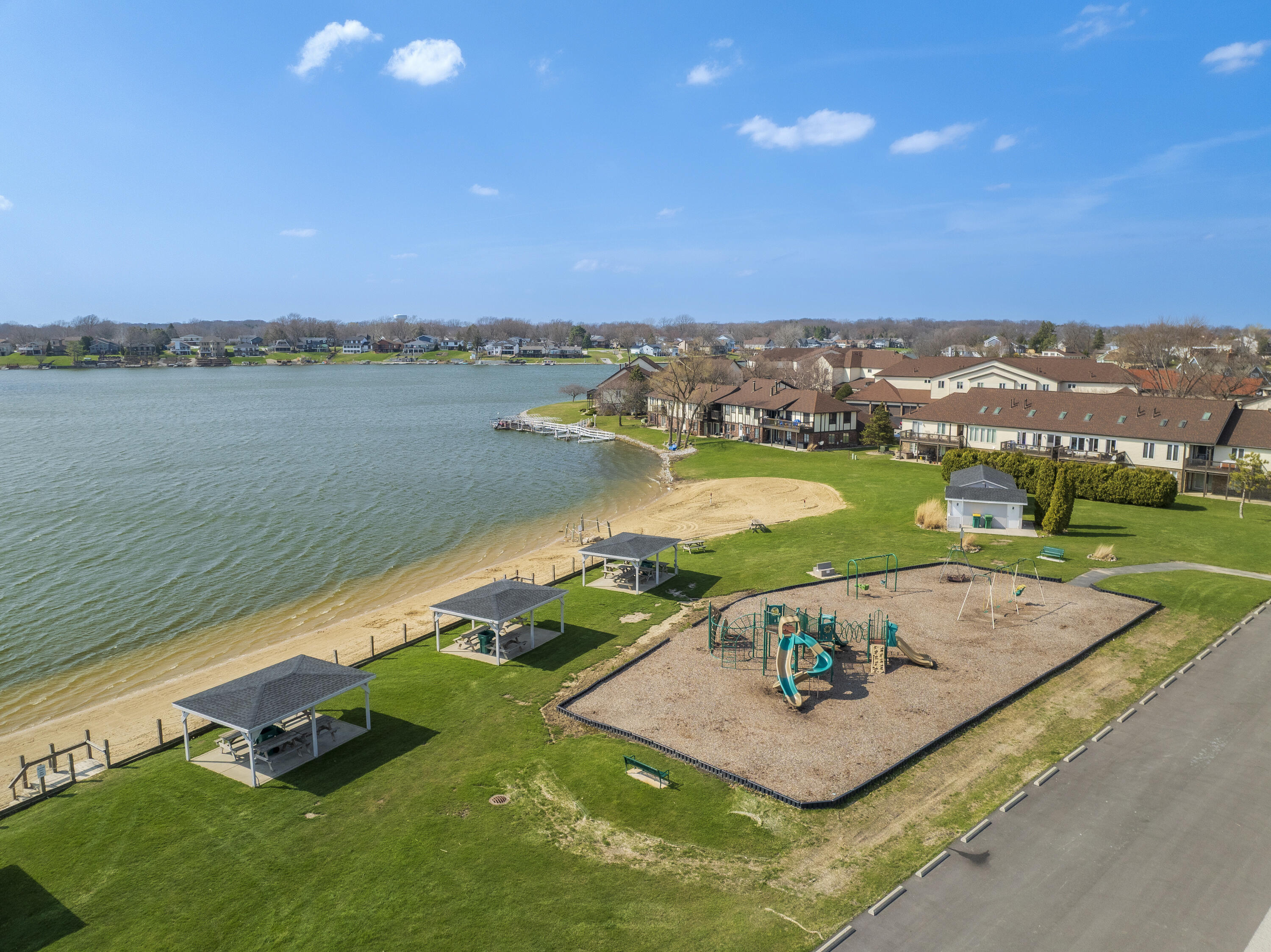 1994 Hidden Valley Drive Crown Point, IN 46307 - Photo 41 of 59 a view of a lake with a city