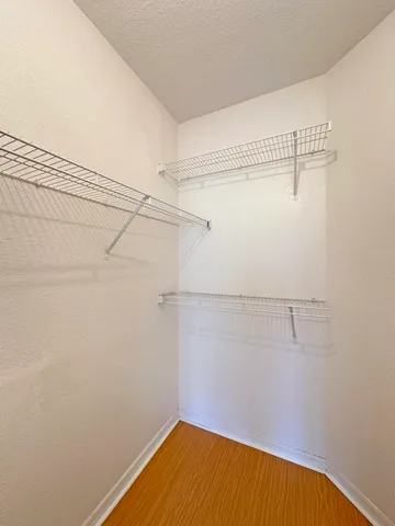 a view of a room with racks on the wall