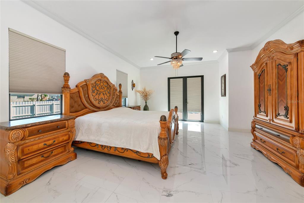 7505 27th Avenue West Bradenton, FL 34209 - Photo 25 of 66 a bed room with a bed and a window