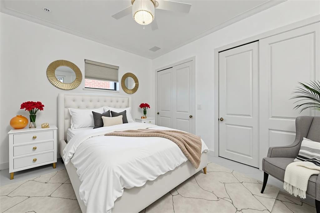 7505 27th Avenue West Bradenton, FL 34209 - Photo 35 of 66 a bedroom with a bed and a dresser