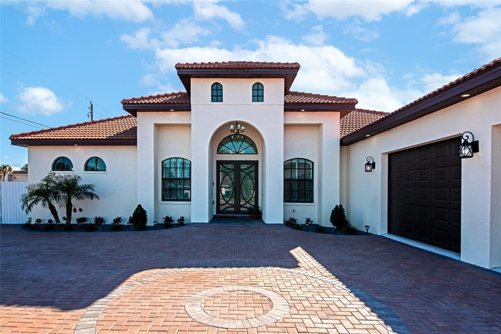 7505 27th Avenue West Bradenton, FL 34209 - Photo 4 of 66 a front view of a house with entryway