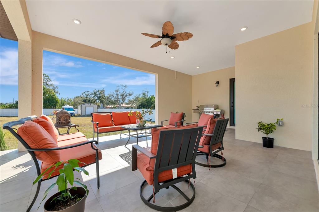 7505 27th Avenue West Bradenton, FL 34209 - Photo 46 of 66 a living room with furniture and a potted plant