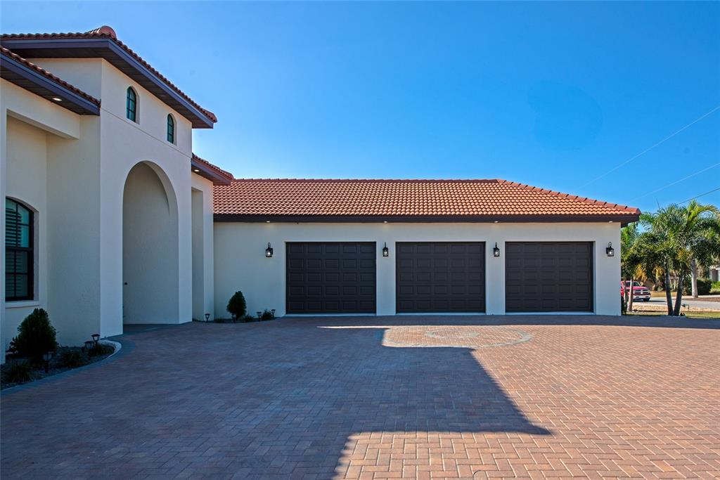 7505 27th Avenue West Bradenton, FL 34209 - Photo 5 of 66 a front view of a house with a yard