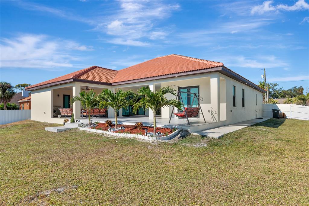 7505 27th Avenue West Bradenton, FL 34209 - Photo 51 of 66 a view of a house with swimming pool and sitting area