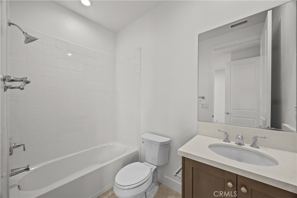 20638 Deer Grass Court Porter Ranch, CA 91326 - Photo 38 of 50 a bathroom with a sink a toilet and shower