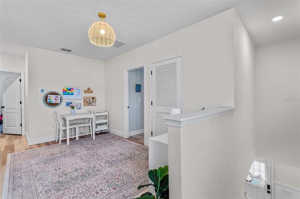 113 Camilla Road DeLand, FL 32724 - Photo 24 of 54 a view of a livingroom with kitchen and furniture